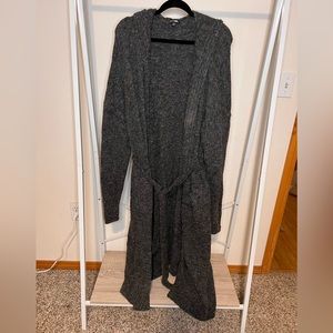 FashionNova long sweater with hood.